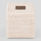 Woven rattan tissue box cover in Whitewash on a light gray studio background