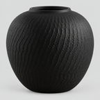 Textured ceramic vase in Matte Black on a light gray studio background.
