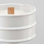 Close up of the smooth glazed rim of the Glossy White ceramic pedestal candle vessel.