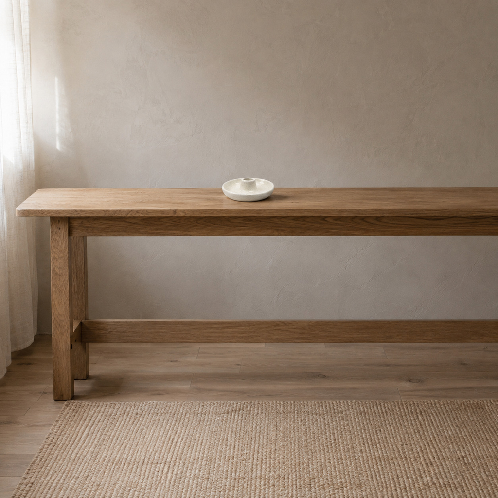 Ceramic taper candle holder in Speckled Off-White on a 120 cm wide oak console table in a calm room