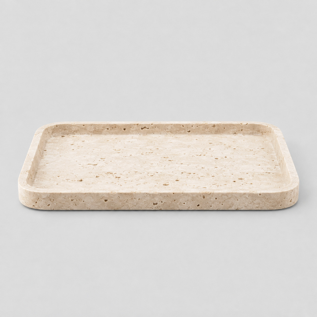 Rectangular travertine catchall tray in Beige Travertine on a light gray studio background.