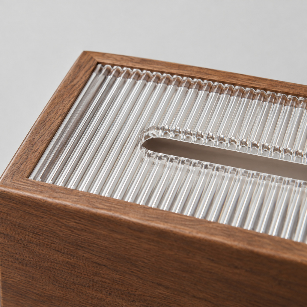 Close up of the fluted pattern of the sliding acrylic lid of the walnut wooden tissue box