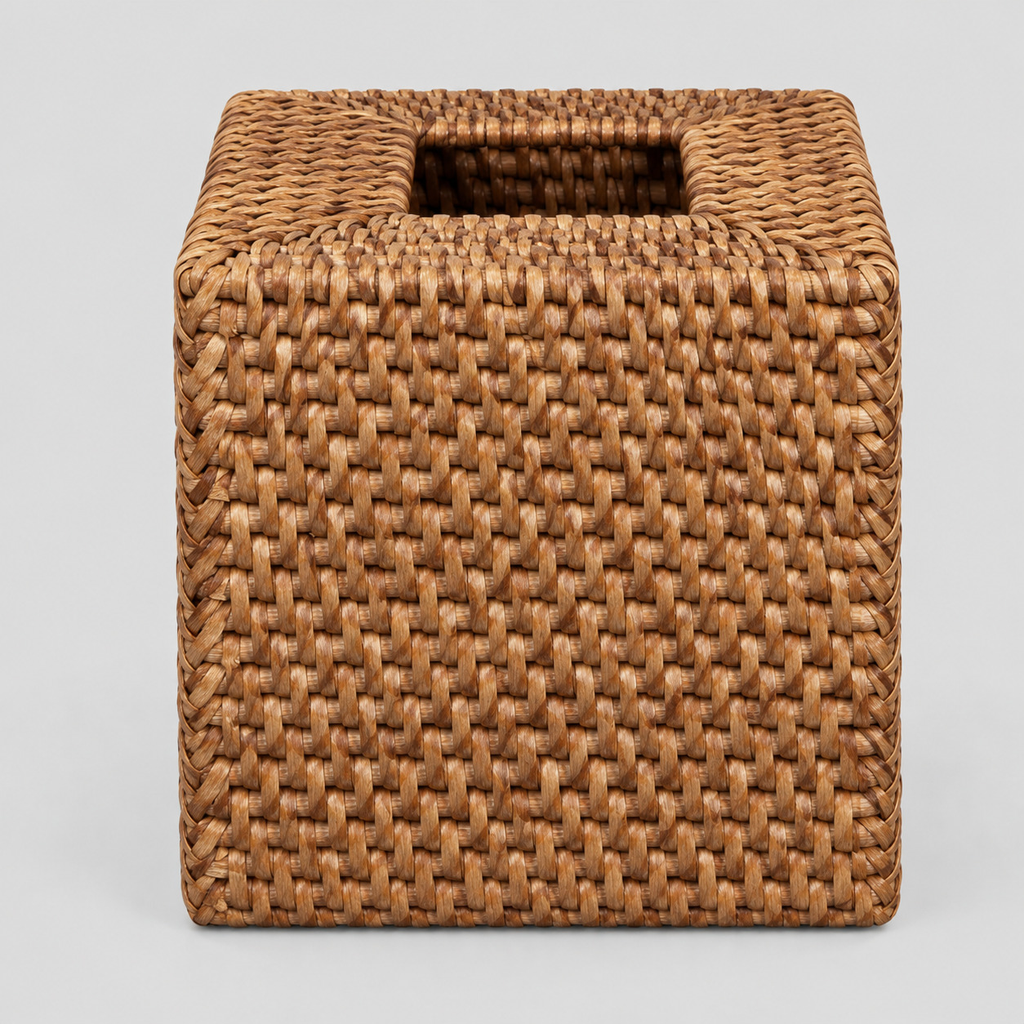 Brown square woven rattan tissue box cover on a light gray studio background.