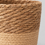 Close up of the stitched seam joining the two woven sections of the Natural Seagrass woven seagrass planter basket.