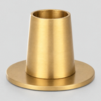 Brass taper candle holder in the Brass finish on a light gray studio background