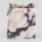 Square marble candle holder in Calacatta Viola on a light gray studio background.