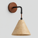 Conical travertine wall sconce in Travertine on a light gray studio background, in its Wall Sconce (Tricolor) shape
