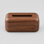 Walnut wooden tissue box on a light gray studio background.