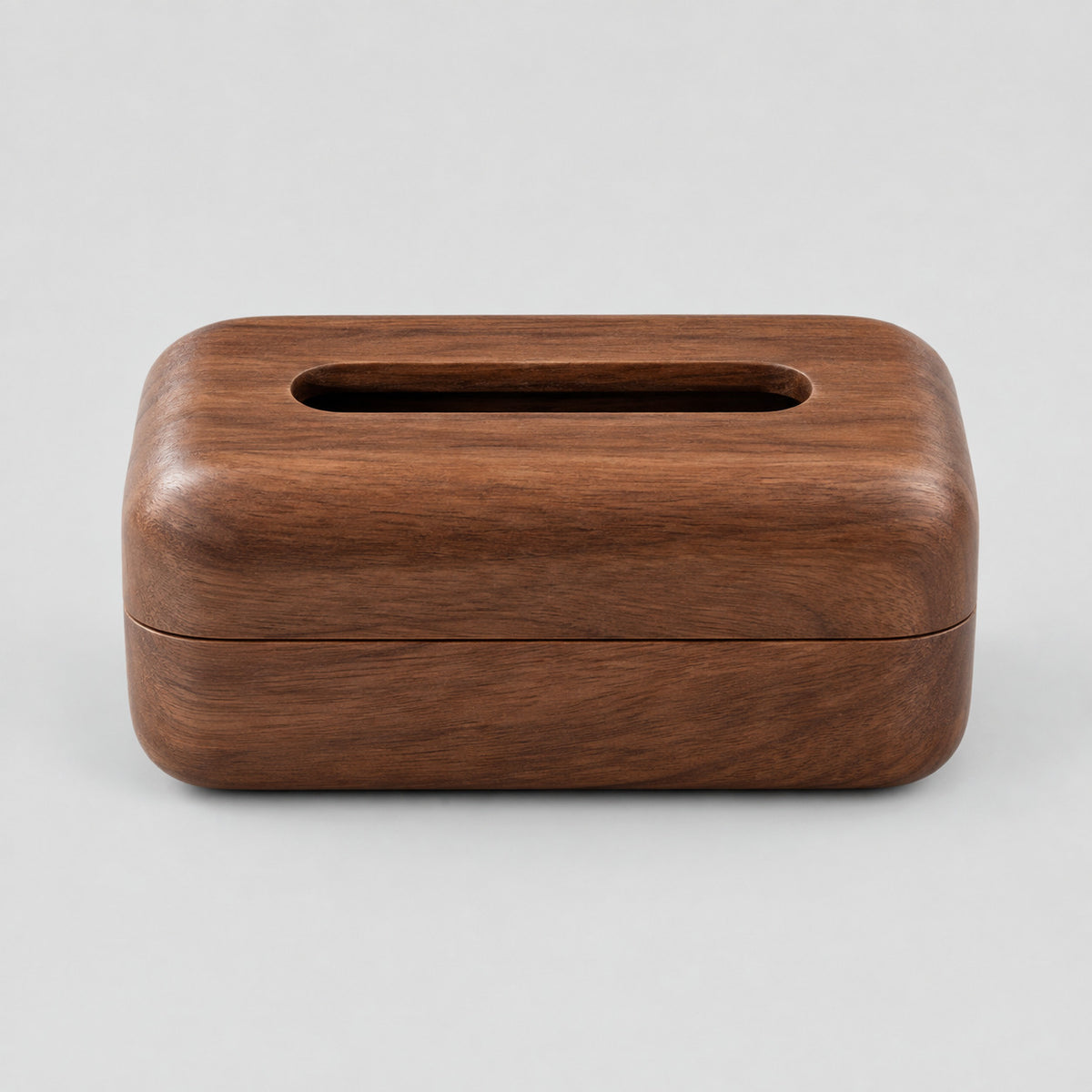 Walnut wooden tissue box on a light gray studio background.
