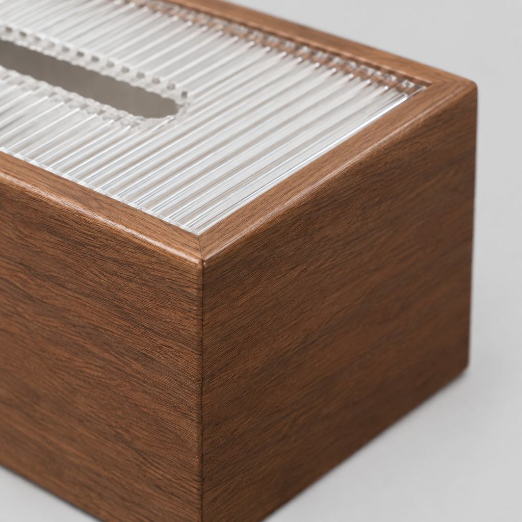 Close up of the mitered corner joint of the walnut wooden tissue box