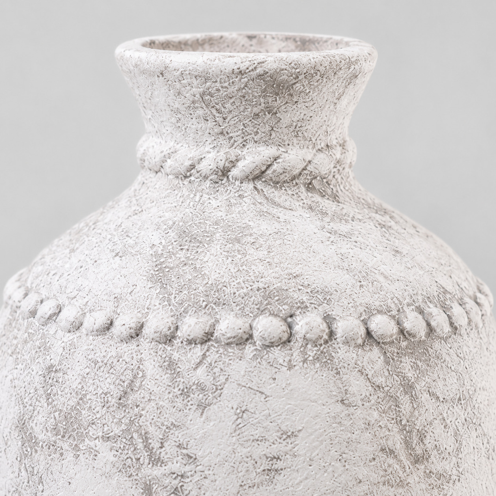 Close up of the embossed beaded band on the rustic textured ceramic urn vase