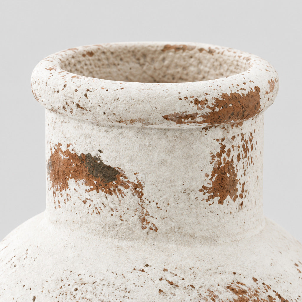 Close up of the thick rolled lip at the neck rim of the rustic wabi-sabi ceramic vase.