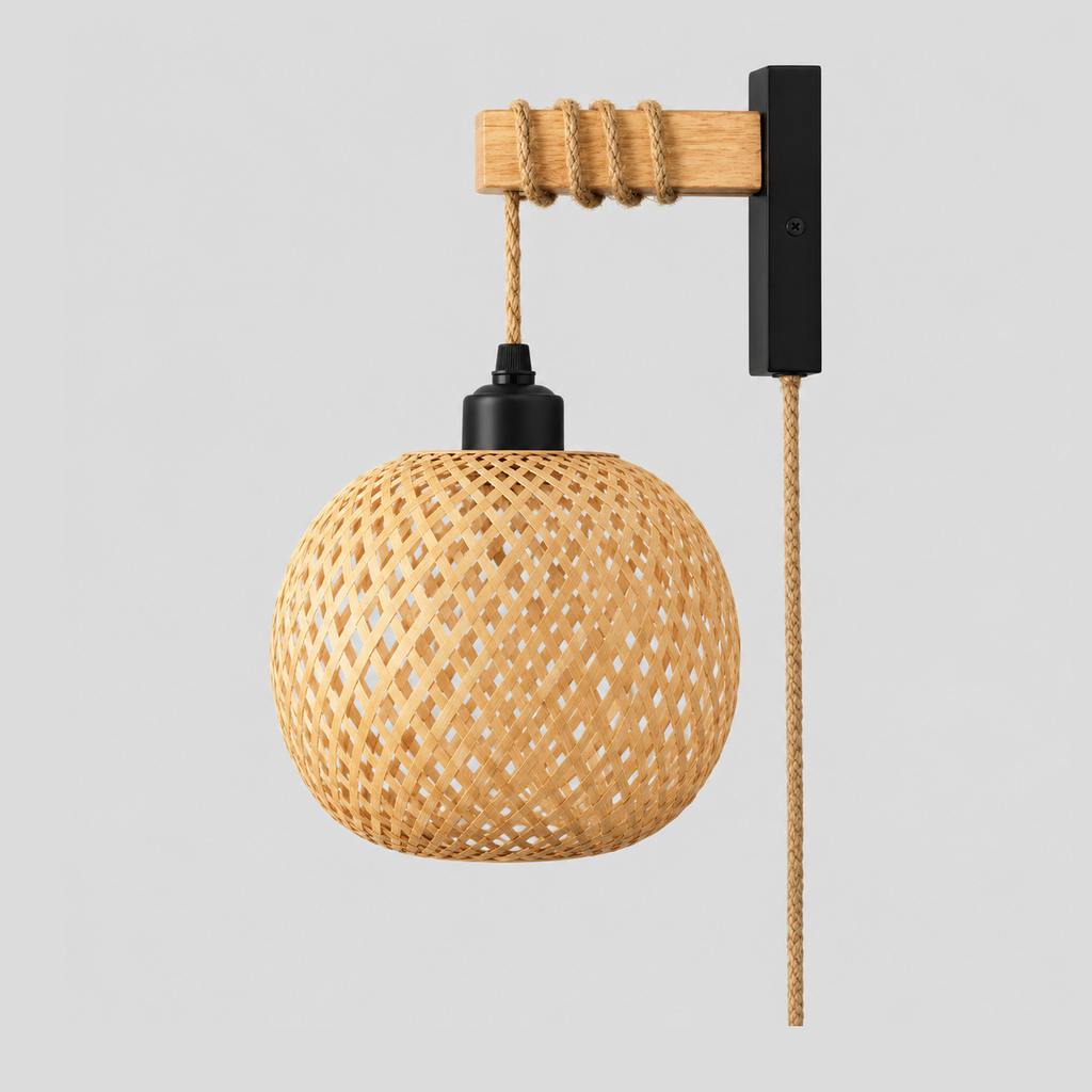 Black finish woven bamboo wall sconce on a light gray studio background