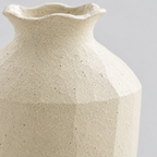 Close up of the textured matte glaze of the textured ceramic vase in Cream.