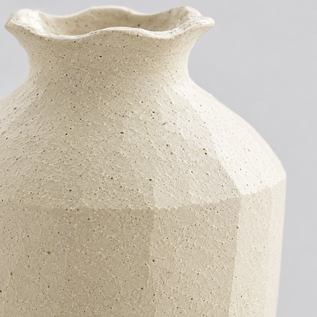Close up of the textured matte glaze of the textured ceramic vase in Cream.