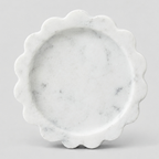Scalloped stone trinket tray in White Marble on a light gray studio background.