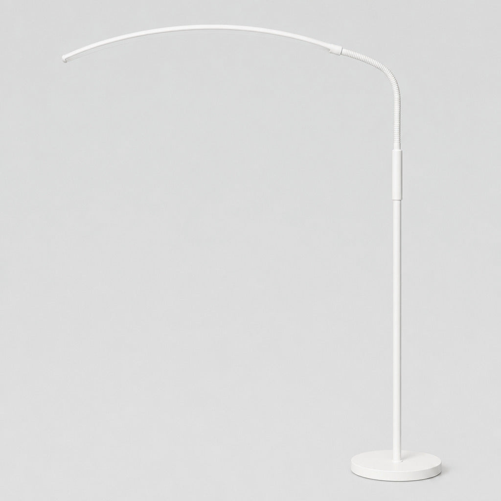 Matte White arched LED floor lamp on a light gray studio background
