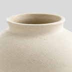 Close up of the flared rolled rim of the Off-White ceramic vase