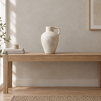 Vintage Beige ceramic pitcher vase on an oak console table in a calm room