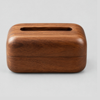 Rounded wooden tissue box cover in Walnut on a light gray studio background