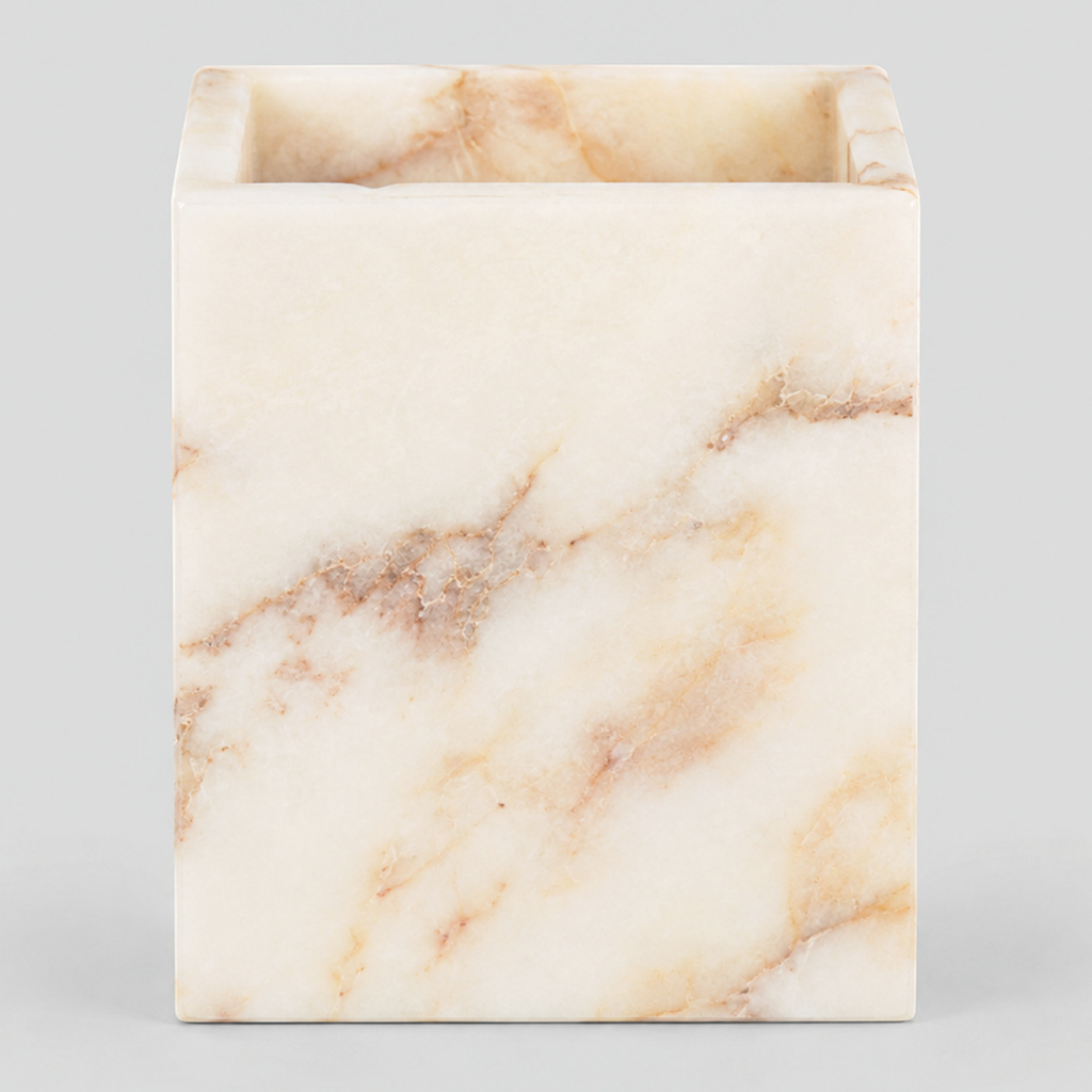 Square marble candle holder in Calacatta Gold on a light gray studio background.