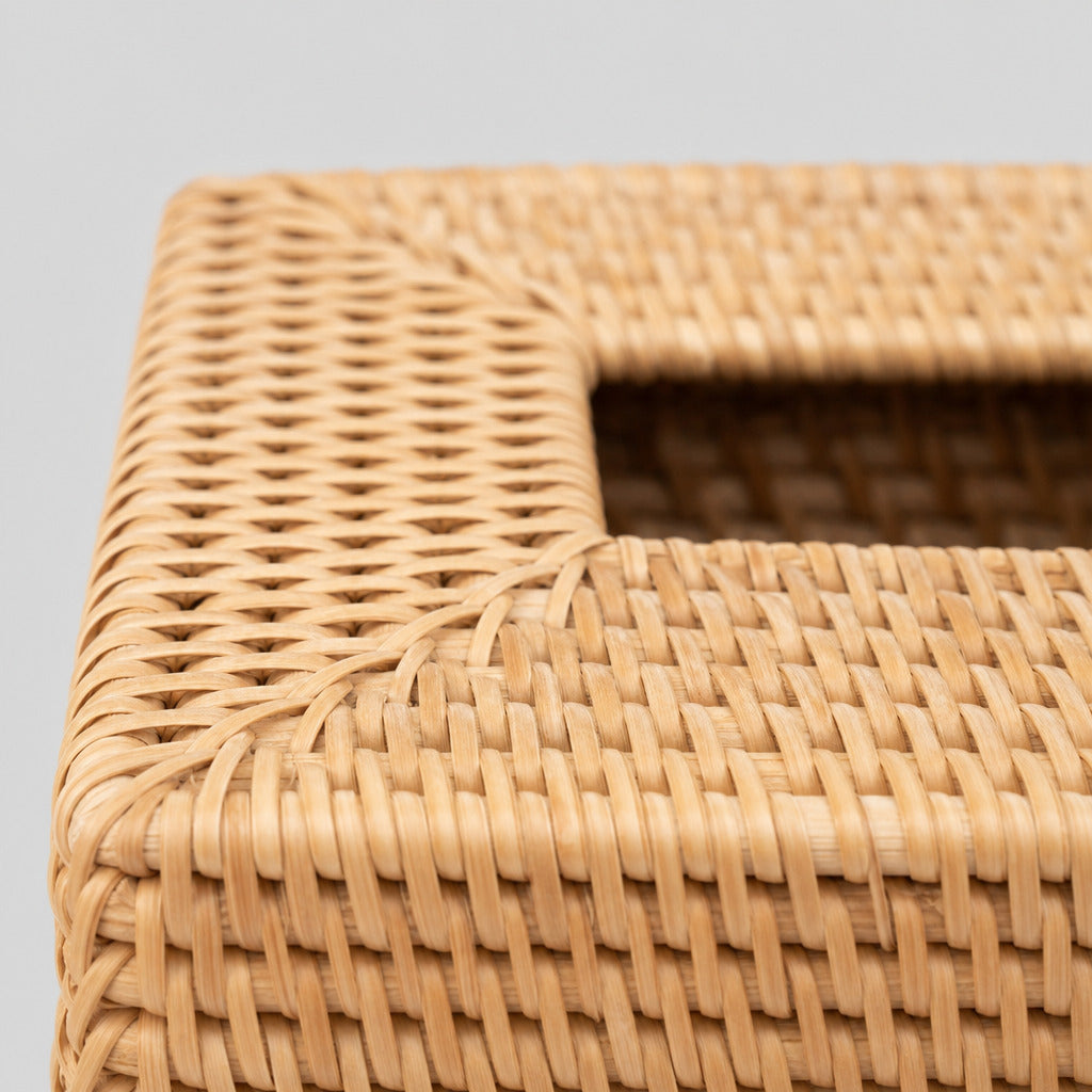 Close up of the braided rim at the top opening of the woven rattan tissue box cover