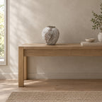 Weathered ceramic vase in Weathered Brown on an oak console table in a calm room.