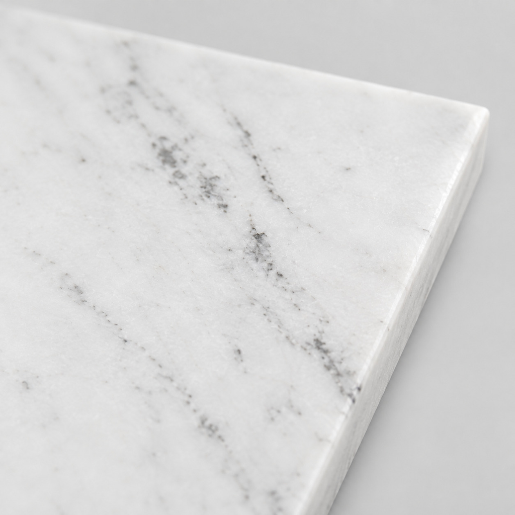 Close up of the smooth polished surface texture of the rectangular marble tray in White Marble.