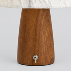 Close up of the dimmer knob on the solid walnut base of the mushroom table lamp