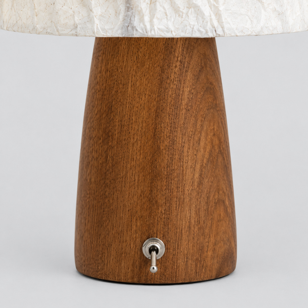 Close up of the dimmer knob on the solid walnut base of the mushroom table lamp