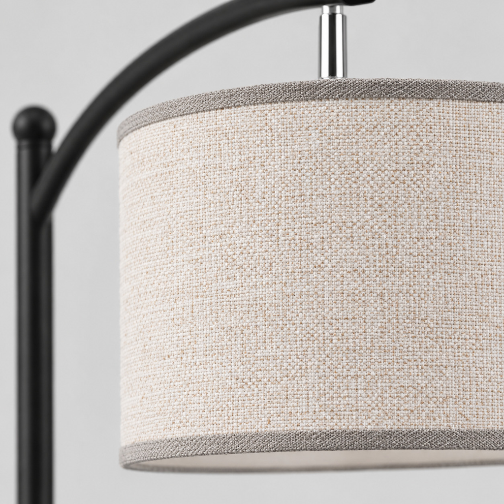 Close up of the weave or fabric texture of the shade on the Matte Black arched floor lamp.