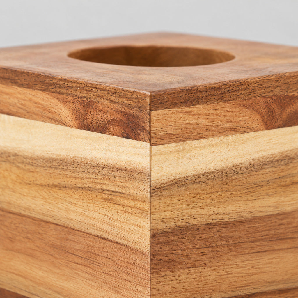 Close up of the corner joint between the wood panels of the square acacia wood tissue box cover