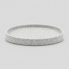 Speckled ceramic catchall tray in Speckled White on a light gray studio background, in its Round shape