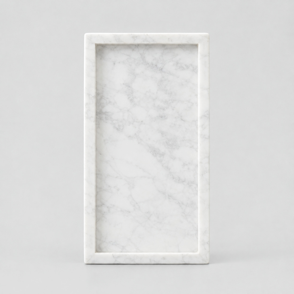 Rectangular marble vanity tray in Carrara White on a light gray studio background