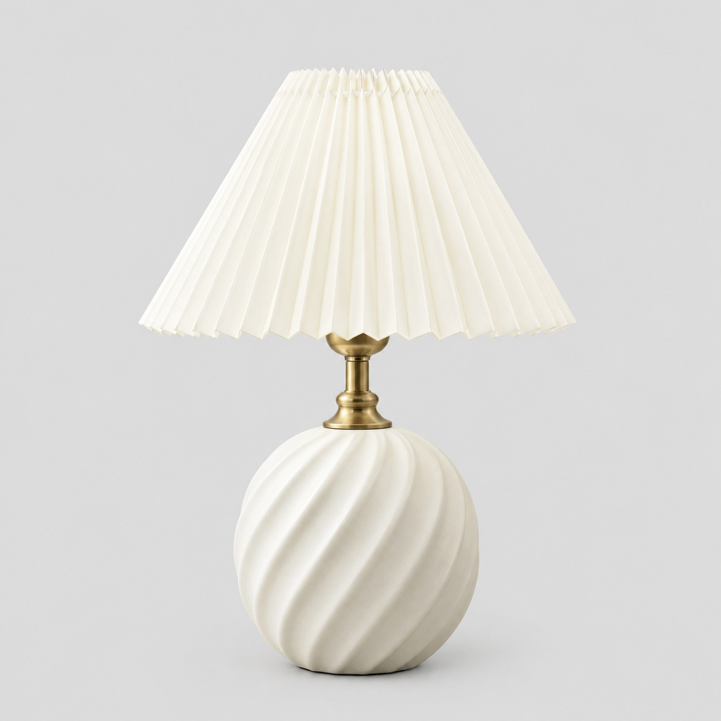 Fluted ceramic table lamp in Milk White on a light gray studio background