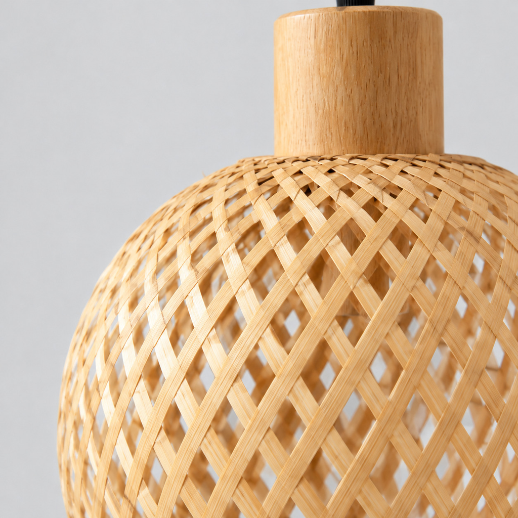 Close up of the weave or fabric texture of the shade of the natural wood woven bamboo wall sconce