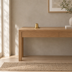 Brass taper candle holder on a 120 cm wide oak console table in a calm room