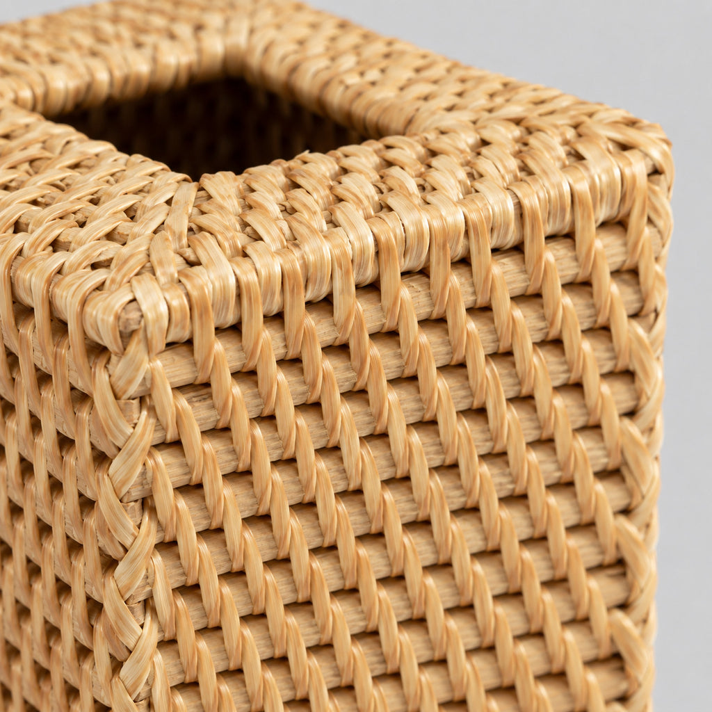 Close up of the braided weave of the rattan sides of the natural rattan cube tissue box cover.