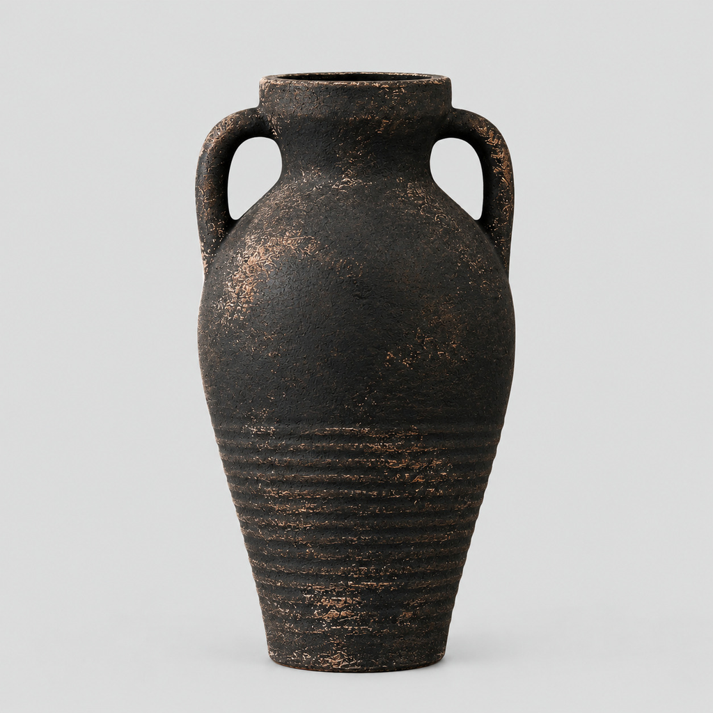 Two-handled ceramic amphora vase in the Antique Black finish on a light neutral gray studio background.