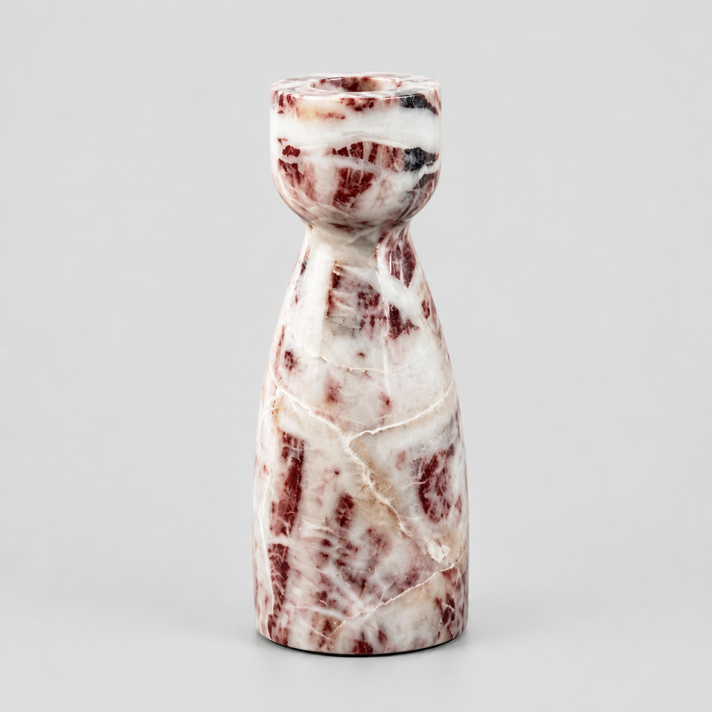 Burgundy Marble vase-shaped marble candle holder on a light gray studio background