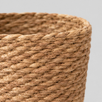Close up of the coiled weave of the upper basket body of the Natural Seagrass woven seagrass planter basket.