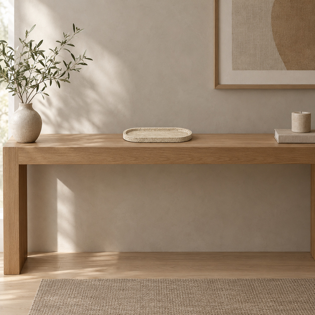Oval stone vanity tray in Beige Travertine on an oak console table in a calm room