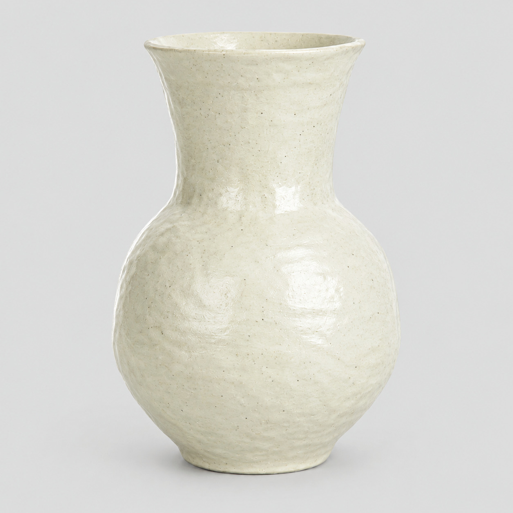 Textured ceramic vase in Off-White on a light gray studio background.