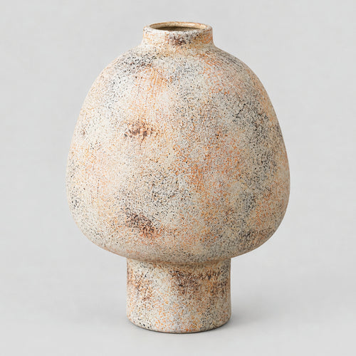 Textured ceramic vase in Speckled Sand finish on a light gray studio background.
