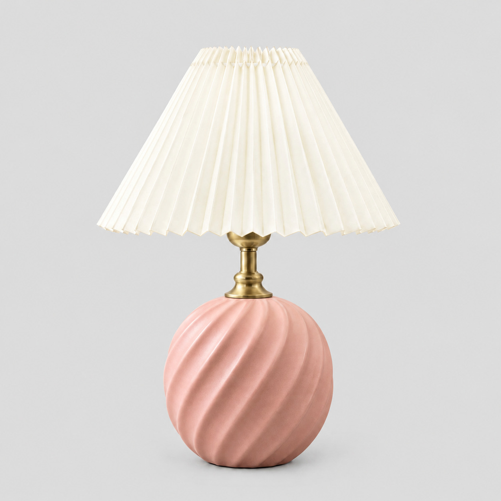 Fluted ceramic table lamp in Soft Pink on a light gray studio background