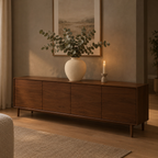 Off-White textured round ceramic vase on a 160 cm wide walnut sideboard beneath a framed print with a bunch of eucalyptus in the vase