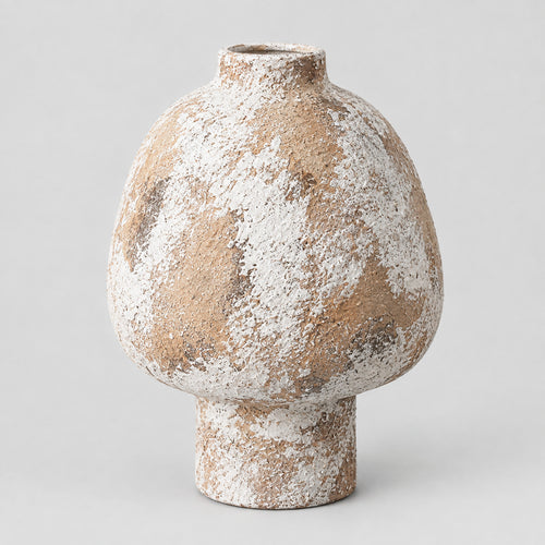 Textured ceramic vase in Distressed White finish on a light gray studio background.