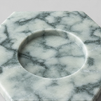 Close up of the smooth circular rim of the candle recess on the Green Marble candle holder.