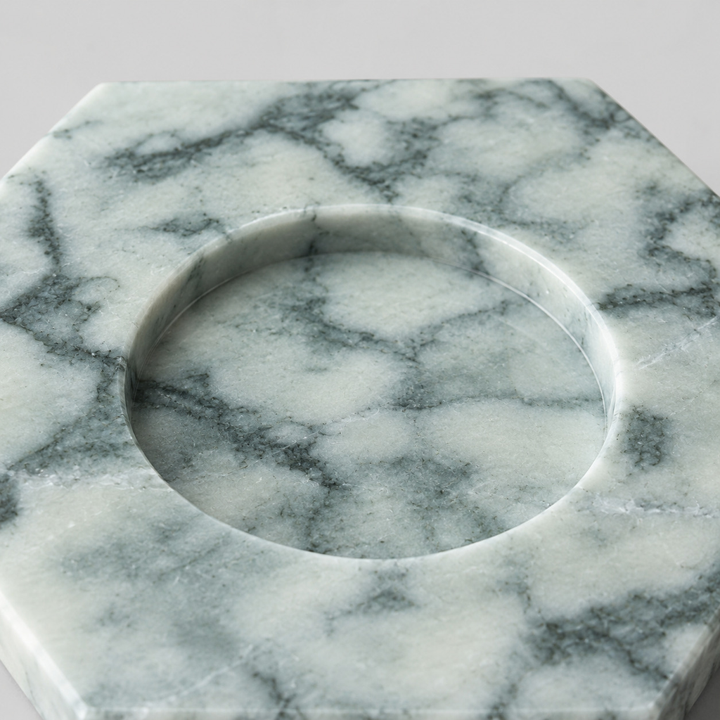 Close up of the smooth circular rim of the candle recess on the Green Marble candle holder.