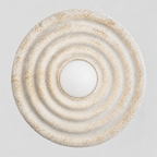 Distressed White circular concentric ripple wall sconce on a light gray studio background.